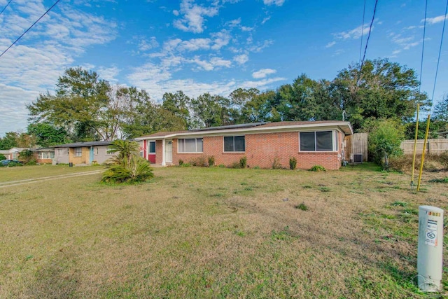 ranch-style home with a front yard