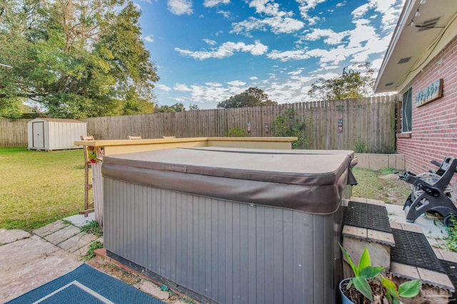 exterior space with a shed and a hot tub