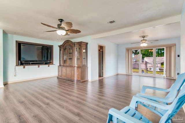 unfurnished room featuring hardwood / wood-style flooring