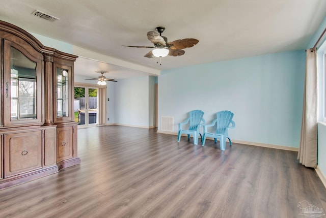 interior space featuring ceiling fan and wood-type flooring