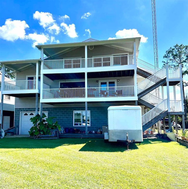 back of property featuring a yard