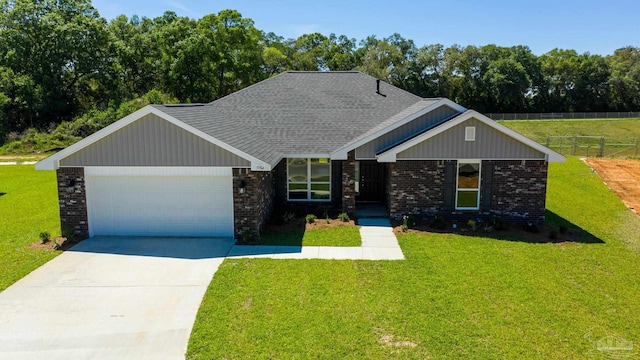 craftsman inspired home featuring a garage and a front yard