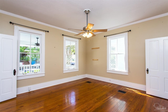 905 N Barcelona St, Pensacola, FL 32501 - unfurnished room with wood-type flooring, plenty of natural light, ceiling fan, and ornamental molding