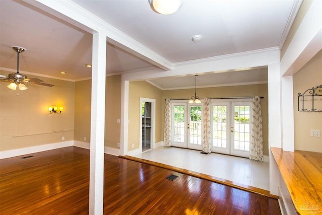 905 N Barcelona St, Pensacola, FL 32501 - empty room with hardwood / wood-style flooring, french doors, ornamental molding, baseboards, and ceiling fan