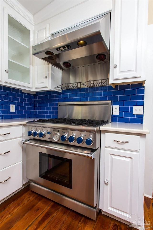 905 N Barcelona St, Pensacola, FL 32501 - kitchen featuring high end range, range hood, white cabinets, and dark wood finished floors