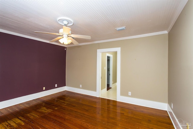 905 N Barcelona St, Pensacola, FL 32501 - unfurnished room with hardwood / wood-style floors, crown molding, baseboards, and a ceiling fan
