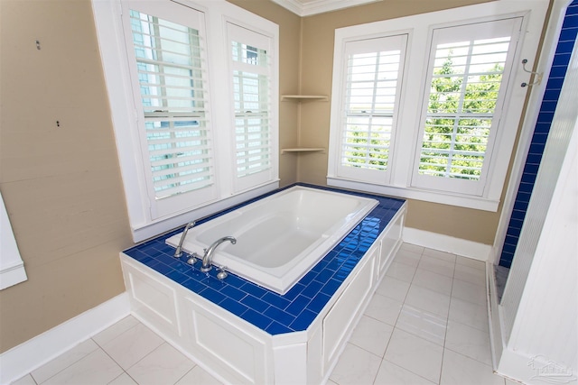 905 N Barcelona St, Pensacola, FL 32501 - full bath with baseboards, a bath, and tile patterned floors