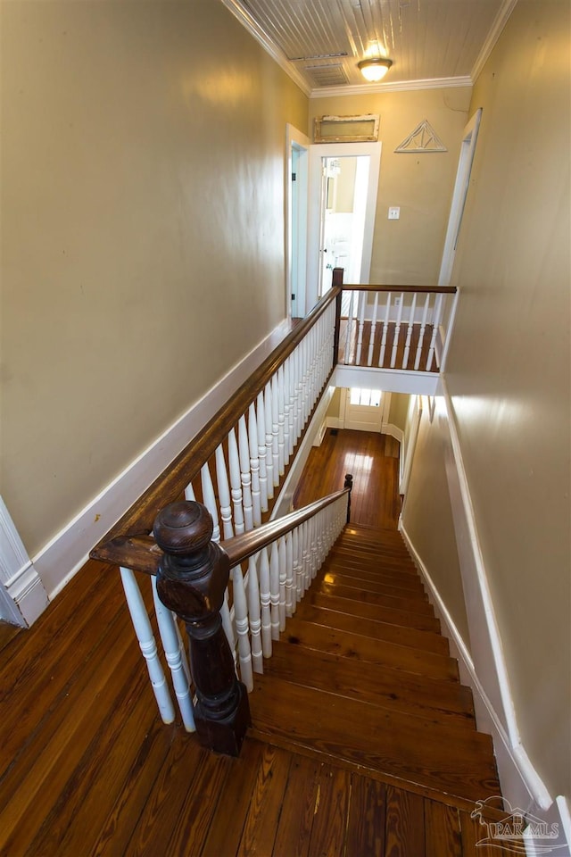 905 N Barcelona St, Pensacola, FL 32501 - stairs featuring ornamental molding and hardwood / wood-style flooring