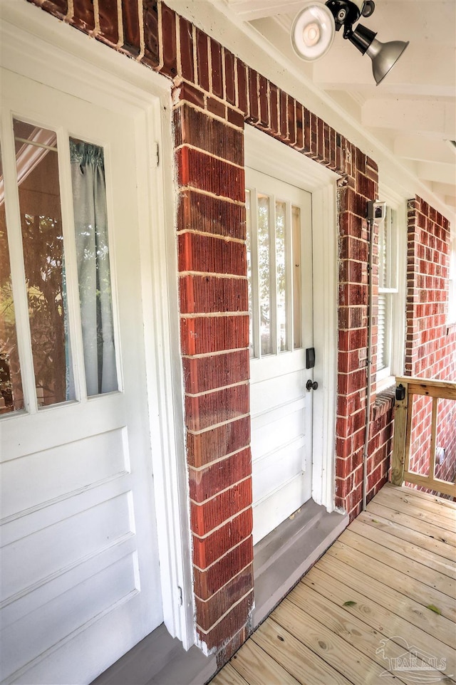 905 N Barcelona St, Pensacola, FL 32501 - property entrance featuring brick siding and ceiling fan
