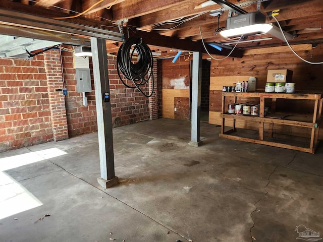905 N Barcelona St, Pensacola, FL 32501 - unfinished basement with electric panel and wood walls
