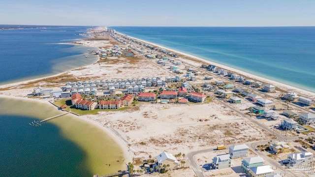 aerial view with a beach view and a water view