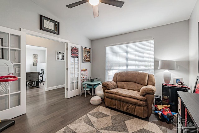 living room featuring french doors, ceiling fan, lofted ceiling, and dark hardwood / wood-style flooring