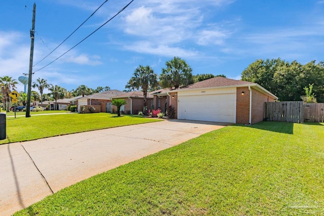 ranch-style house with a front lawn and a garage