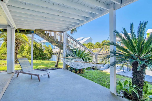 view of patio featuring a water view