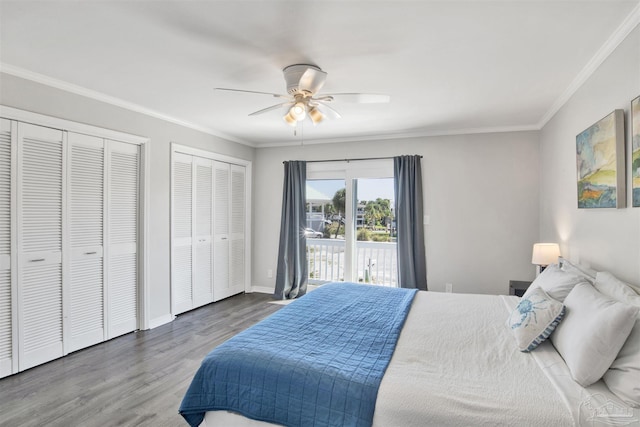 bedroom with multiple closets, ceiling fan, crown molding, access to outside, and hardwood / wood-style flooring