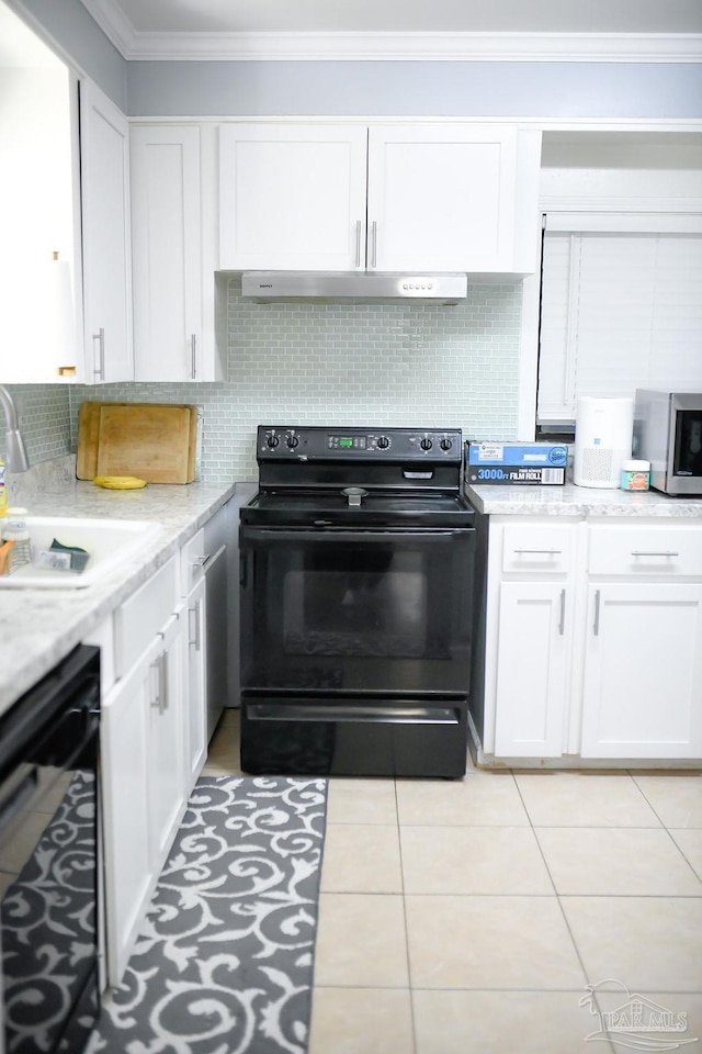 kitchen featuring black appliances, white cabinets, crown molding, and a sink