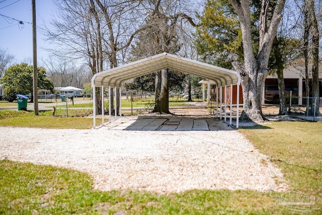 view of community with a detached carport