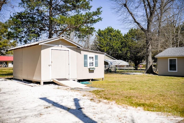 view of shed with a carport