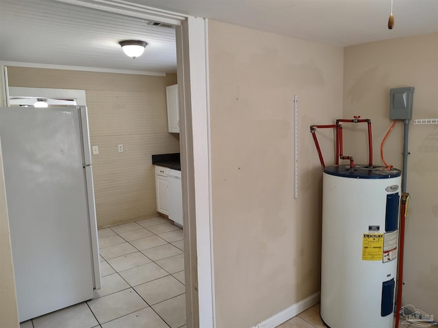 utility room featuring electric water heater