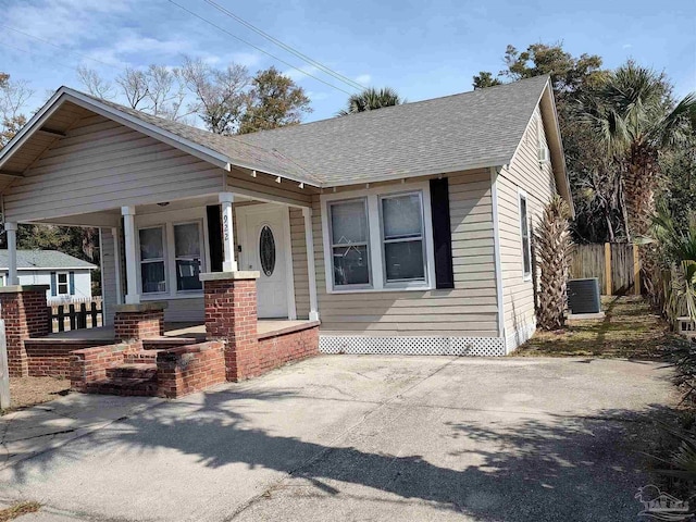 view of front of home with central AC and covered porch