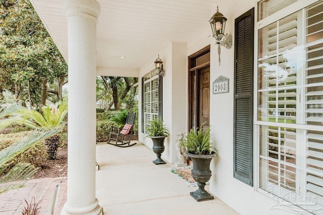 view of patio featuring a porch