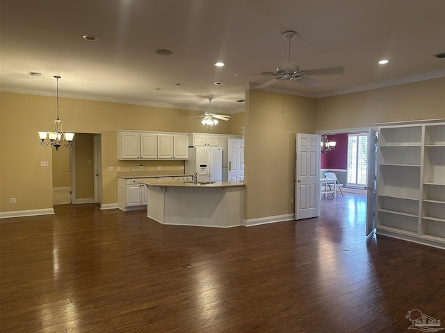 kitchen with white fridge with ice dispenser, ornamental molding, and dark wood-style flooring