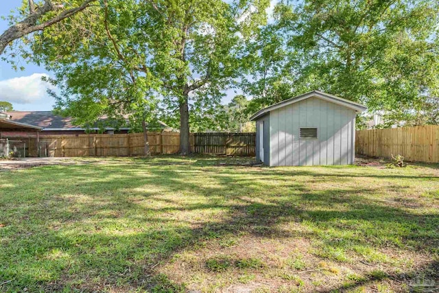 view of yard with a storage shed