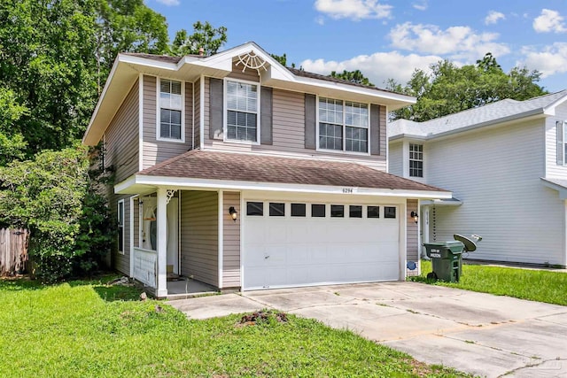 front facade with a garage and a front yard