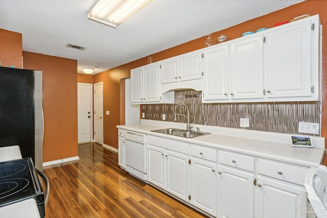 kitchen featuring stainless steel fridge, sink, white cabinetry, dishwasher, and dark hardwood / wood-style flooring