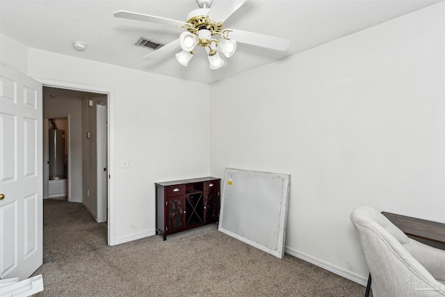 unfurnished office with light carpet and ceiling fan