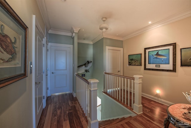 hallway with recessed lighting, dark wood-type flooring, ornamental molding, an upstairs landing, and baseboards