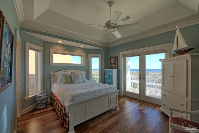 bedroom with ornamental molding, multiple windows, visible vents, and access to exterior