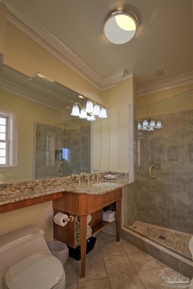 bathroom featuring toilet, a stall shower, crown molding, and tile patterned floors