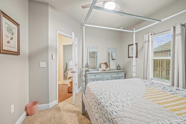 bedroom with baseboards, a ceiling fan, and light colored carpet