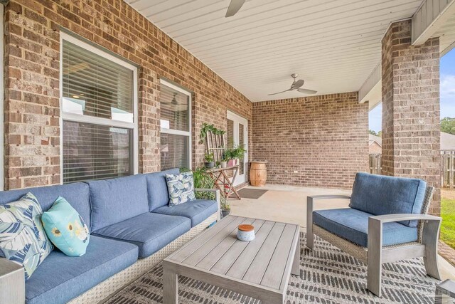 view of patio / terrace featuring an outdoor living space and a ceiling fan