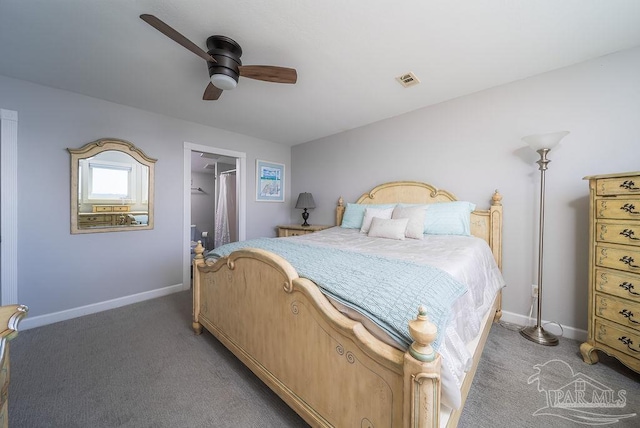 carpeted bedroom featuring a closet, visible vents, a spacious closet, a ceiling fan, and baseboards