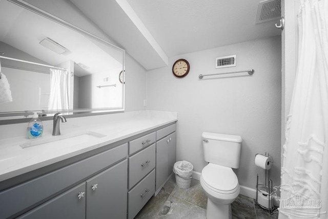 bathroom with toilet, baseboards, visible vents, and vanity