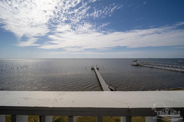 dock area featuring a water view