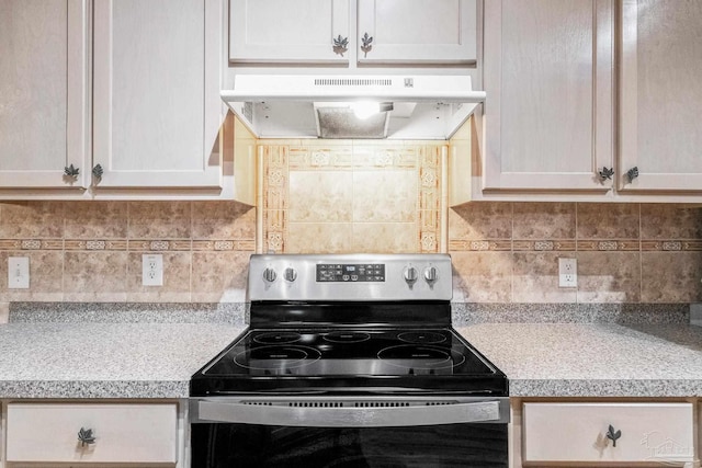 6240 Tributary St, Pensacola, FL 32526 - kitchen with stainless steel range with electric stovetop and decorative backsplash