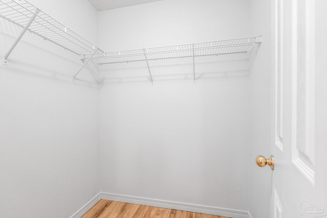 6240 Tributary St, Pensacola, FL 32526 - spacious closet featuring hardwood / wood-style floors