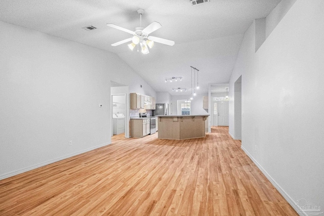 6240 Tributary St, Pensacola, FL 32526 - unfurnished living room with lofted ceiling, light hardwood / wood-style flooring, and ceiling fan