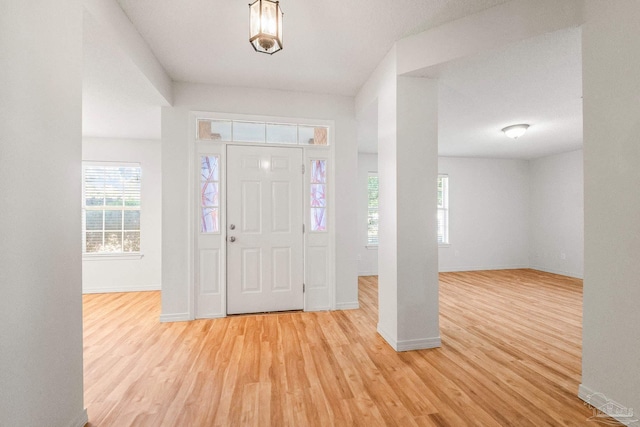 6240 Tributary St, Pensacola, FL 32526 - foyer entrance featuring light hardwood / wood-style flooring