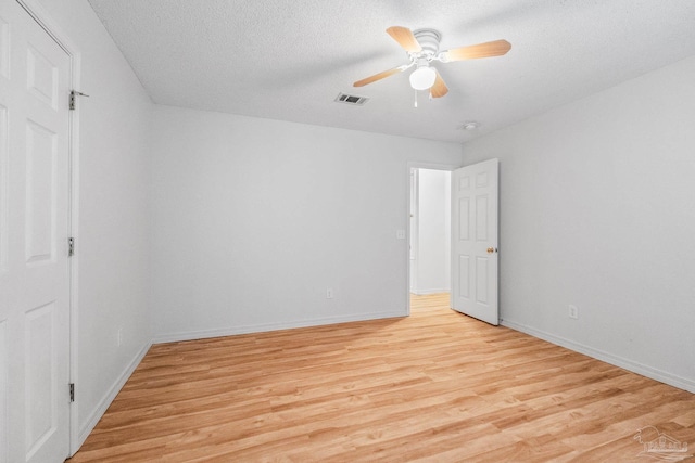 6240 Tributary St, Pensacola, FL 32526 - unfurnished bedroom with ceiling fan, a textured ceiling, and light wood-type flooring