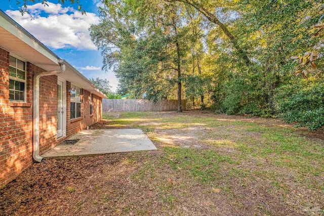 6240 Tributary St, Pensacola, FL 32526 - view of yard featuring a patio area