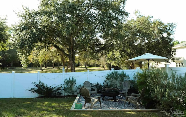 exterior space with an outdoor fire pit