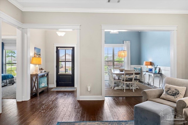 1504 Cadence Loop, Cantonment, FL 32533 - entryway featuring hardwood / wood-style floors, ornamental molding, plenty of natural light, and baseboards