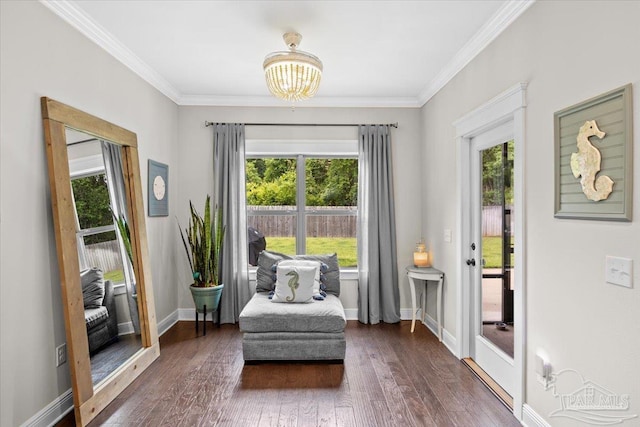 1504 Cadence Loop, Cantonment, FL 32533 - sitting room featuring plenty of natural light, wood finished floors, ornamental molding, baseboards, and a chandelier