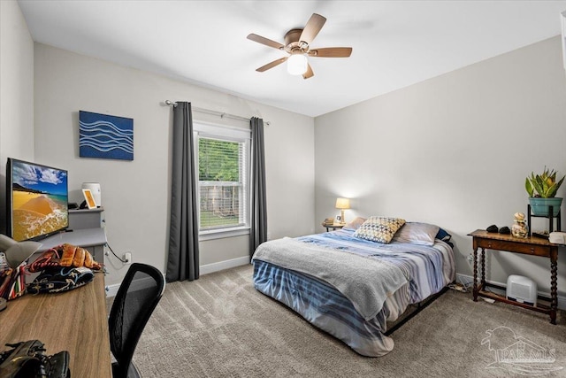 1504 Cadence Loop, Cantonment, FL 32533 - bedroom featuring baseboards, carpet flooring, and a ceiling fan
