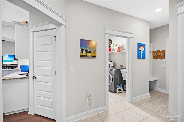 1504 Cadence Loop, Cantonment, FL 32533 - hall featuring separate washer and dryer, baseboards, light tile patterned flooring, and recessed lighting