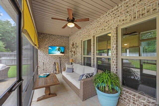 1504 Cadence Loop, Cantonment, FL 32533 - sunroom with a ceiling fan and an outdoor living space
